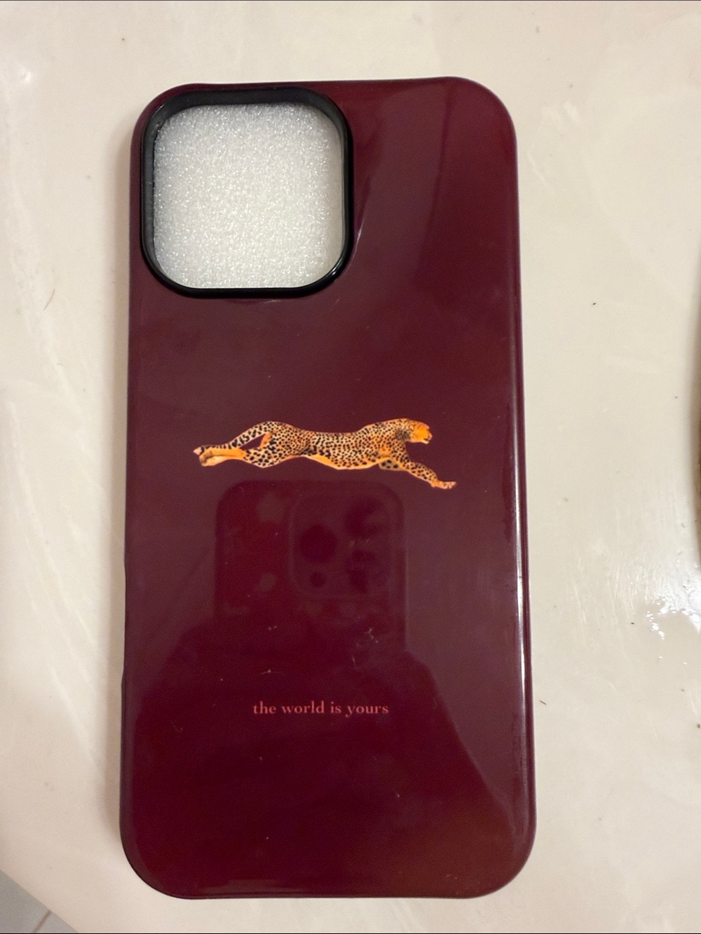 Maroon Cheetah iPhone 16 Pro Max the world is yours phone case